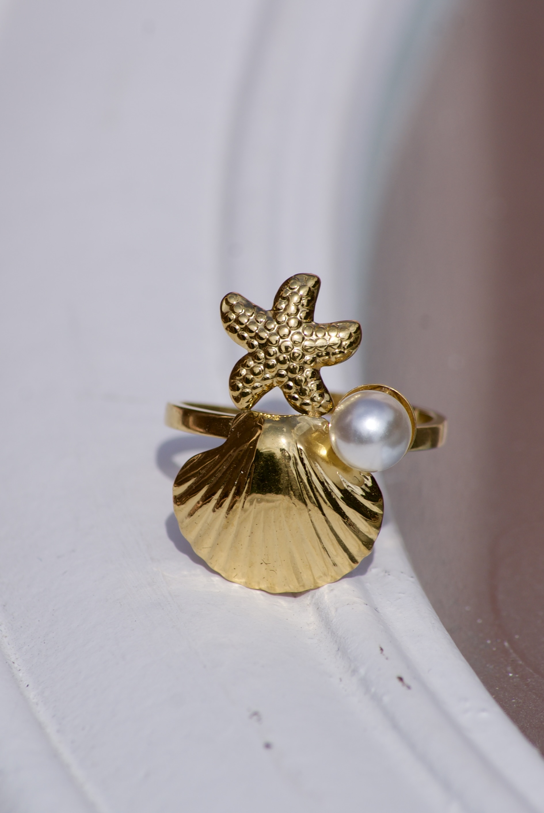 Zeester en parel ring